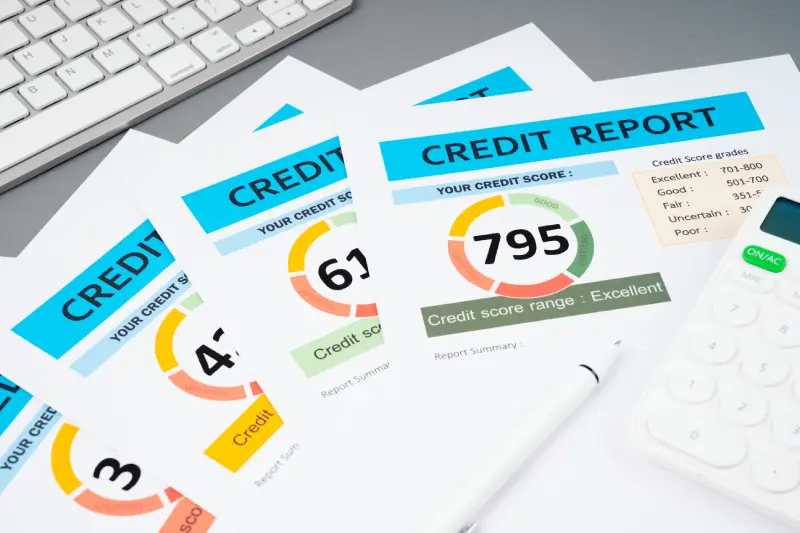 GettyImages-1485088246 (3) (1) Credit reports with scores and calculator.