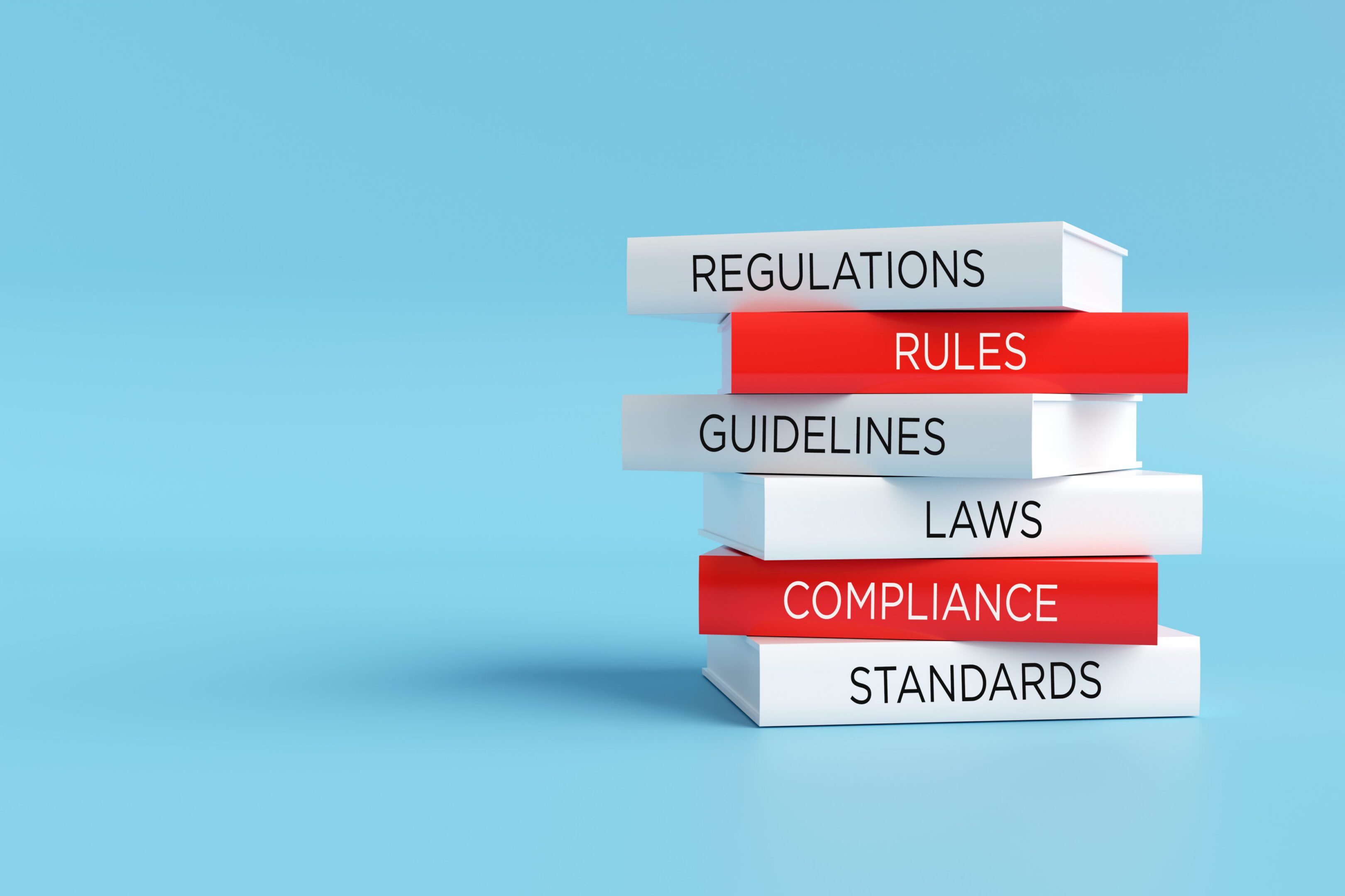 Books forming a stack with words regulations, rules, guidelines, laws, compliance and standards, compliance concept. 3D render.